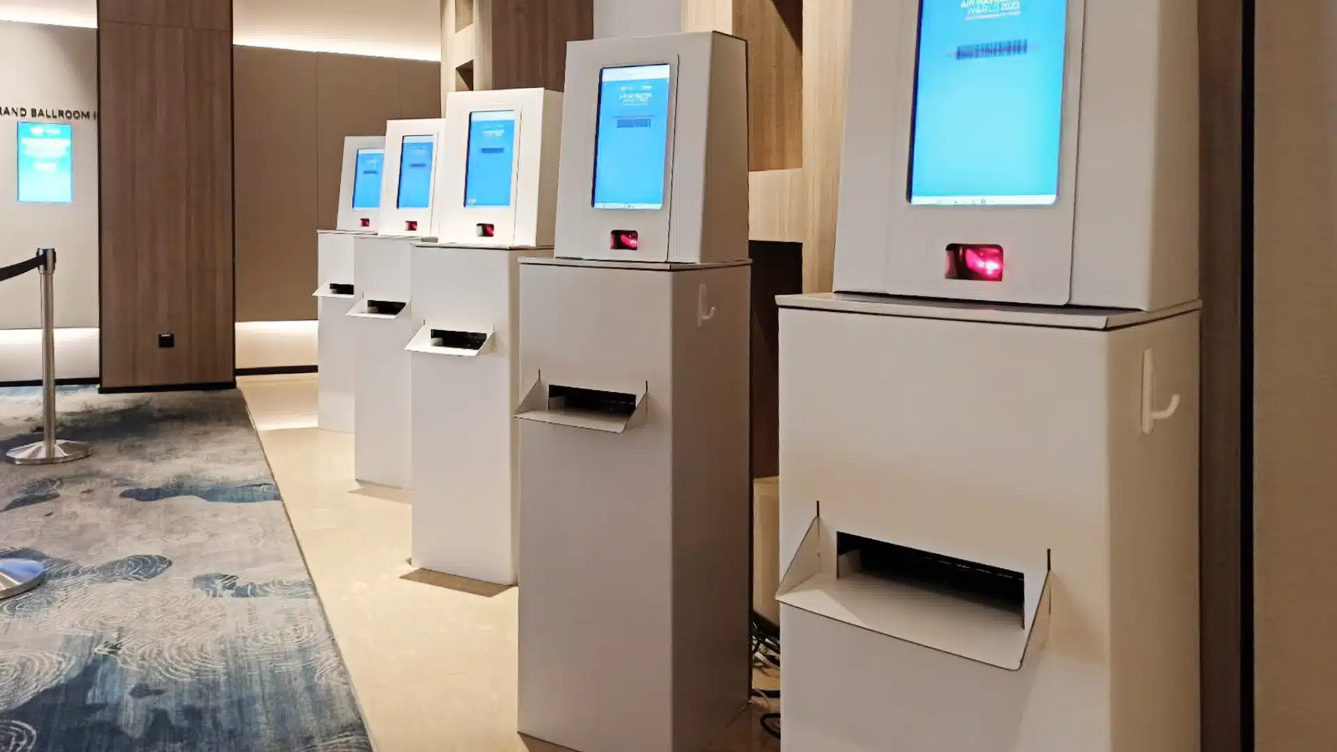 Attendee using a self-service check-in kiosk