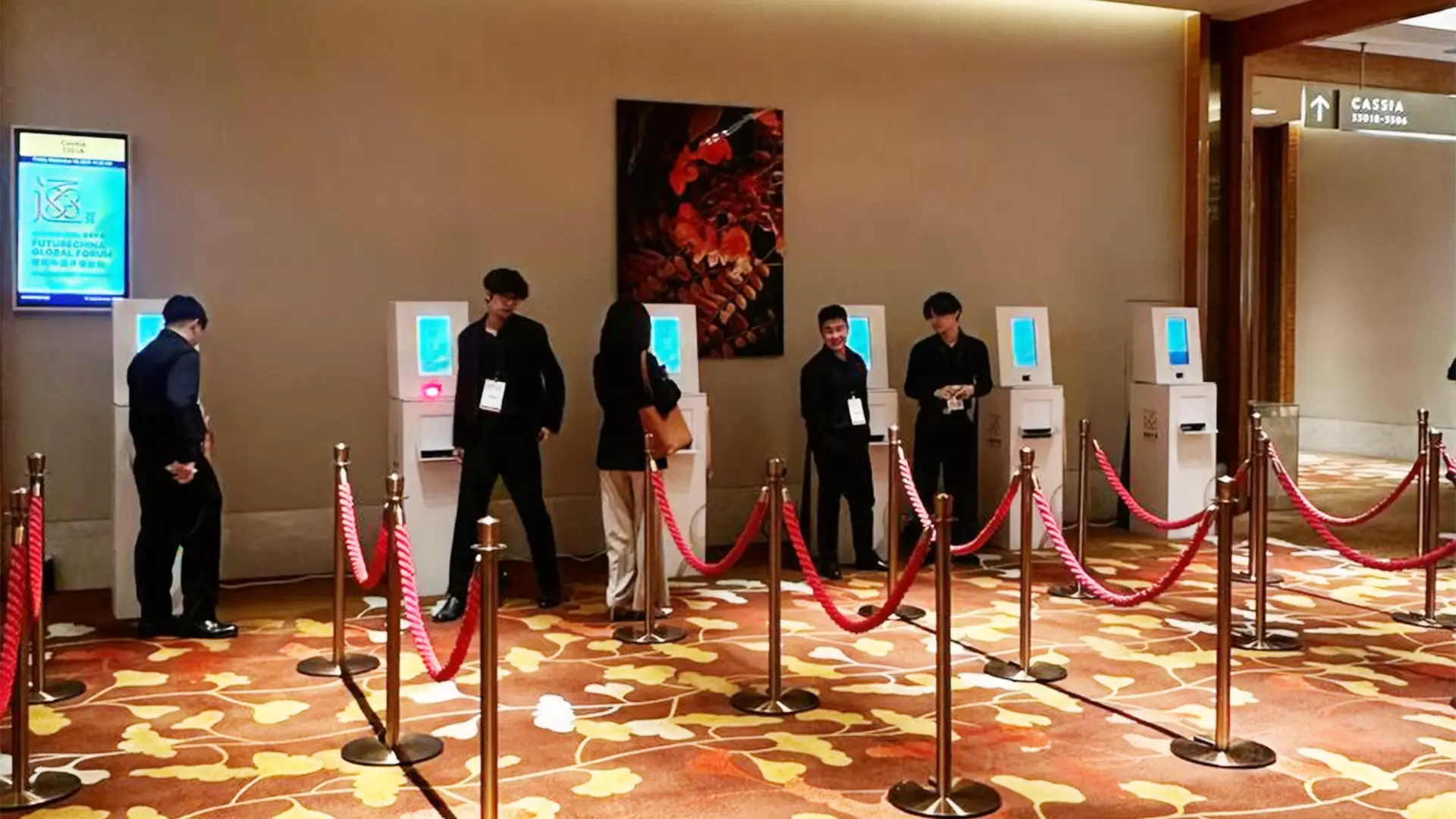 Mixed line of attendees using both self-service and staffed check-in